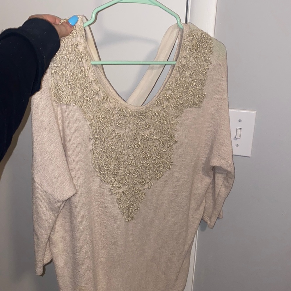 Charming Charlie beige sweater.